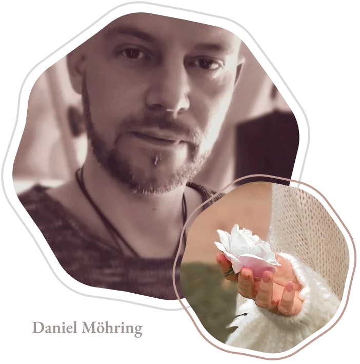 Daniel-moehring Mann mit Bart hält eine Blume in der Hand, während er in die Kamera schaut.